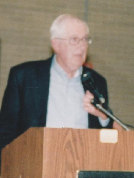 Bill Fisher at podium.